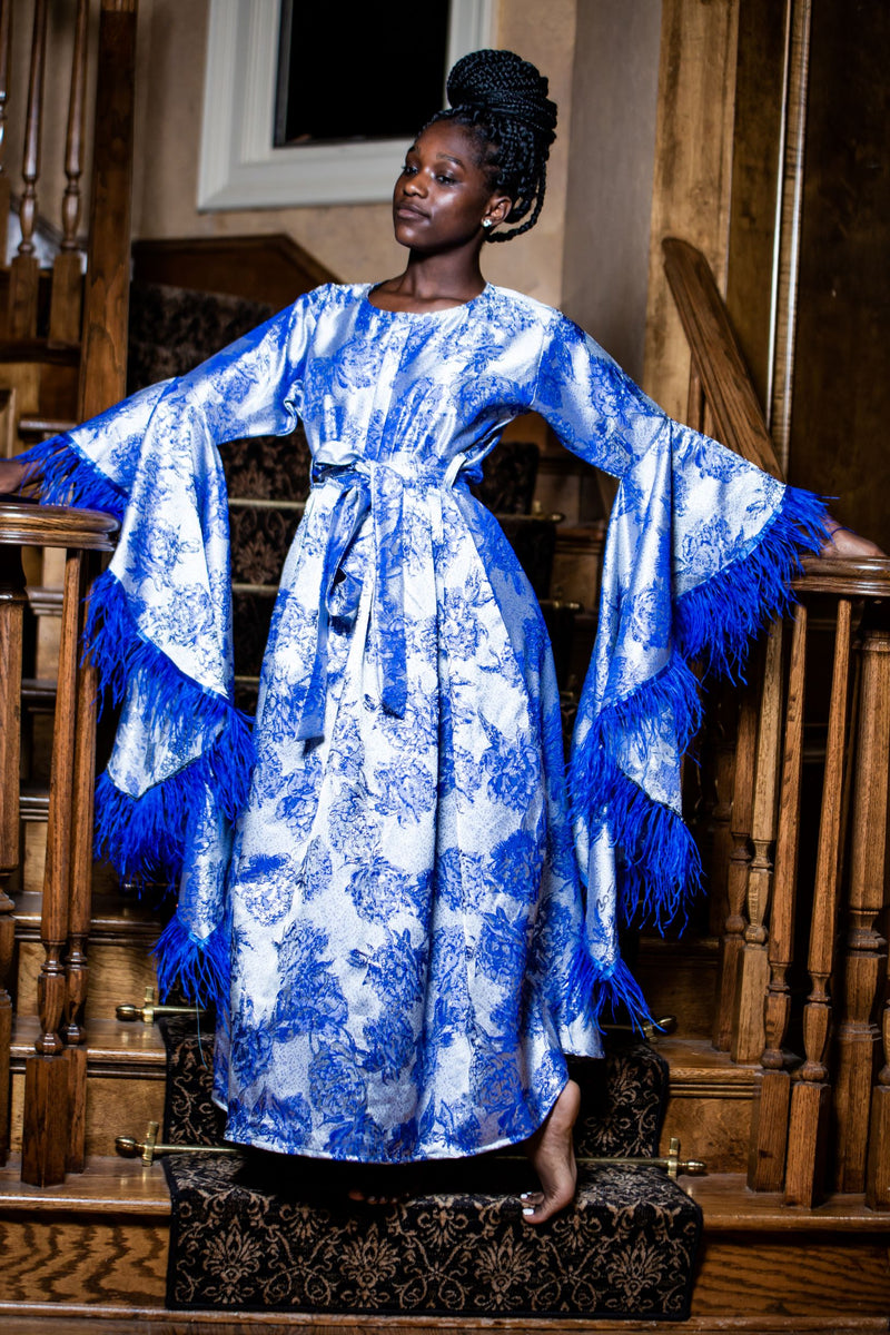 plus size royal blue gown with feathers wide sleeves